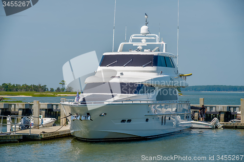 Image of boats and fishing boats in the harbor marina