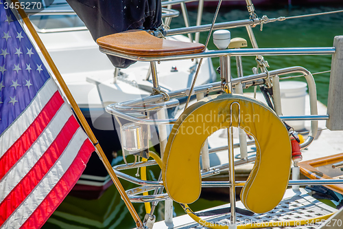 Image of boat captains seat with american flag