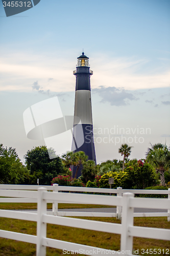 Image of Tybee Island Light with storm approaching