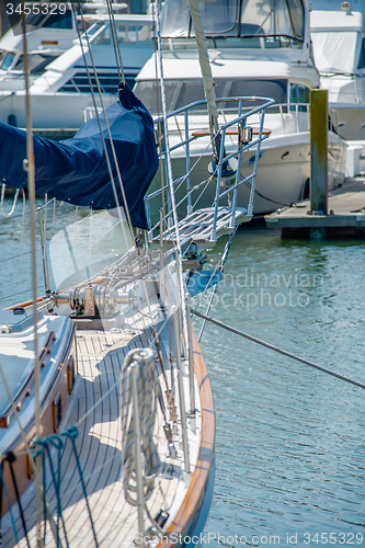 Image of boats and fishing boats in the harbor marina