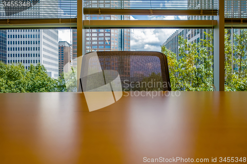 Image of office table and chair across in corporate office 