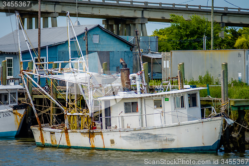 Image of boats and fishing boats in the harbor marina