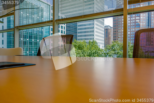 Image of office table and chair across in corporate office 