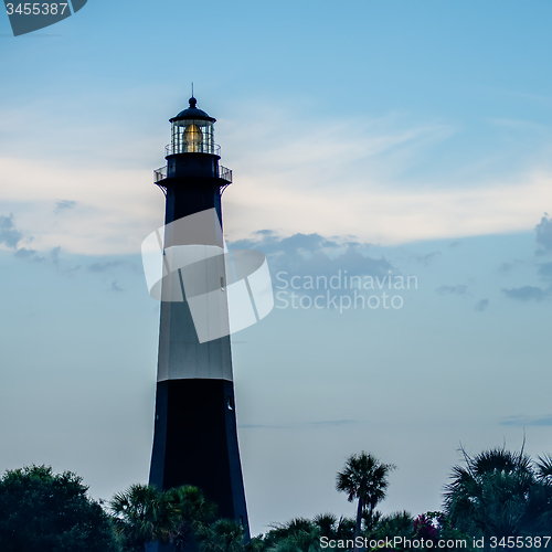 Image of Tybee Island Light with storm approaching