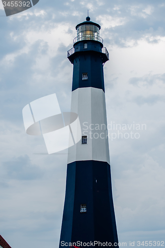 Image of Tybee Island Light with storm approaching