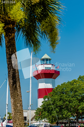 Image of A clear blue sky features the Harbour Town Lighthouse - famous l