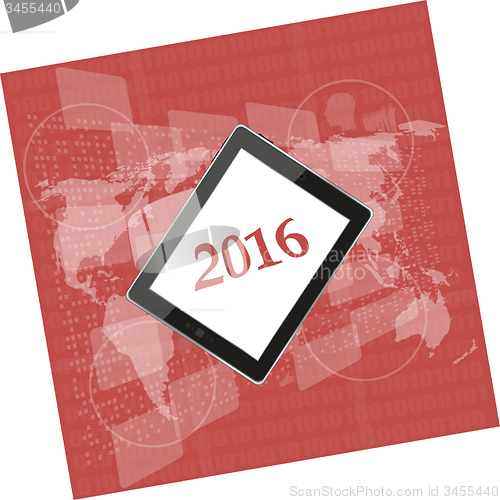 Image of tablet pc or smart phone on business digital touch screen, world map, happy new year 2016 concept