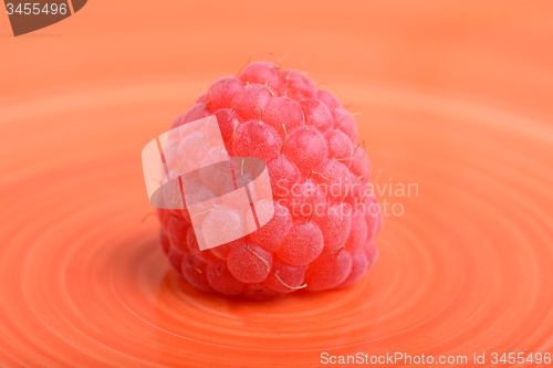 Image of Ripe red raspberries close up