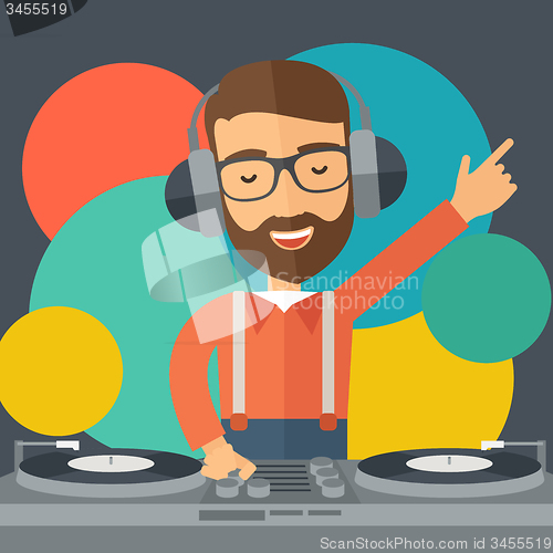 Image of Disc jockey mixing music.