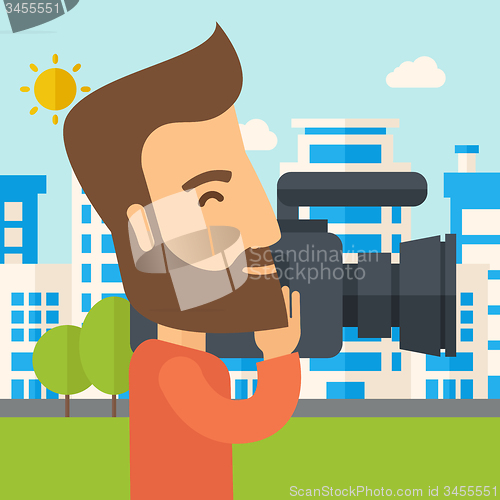 Image of Cameraman with video camera