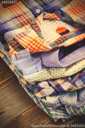 Image of bright shirts in a pile