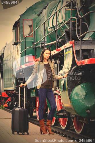 Image of beautiful middle-aged women in retro style travel