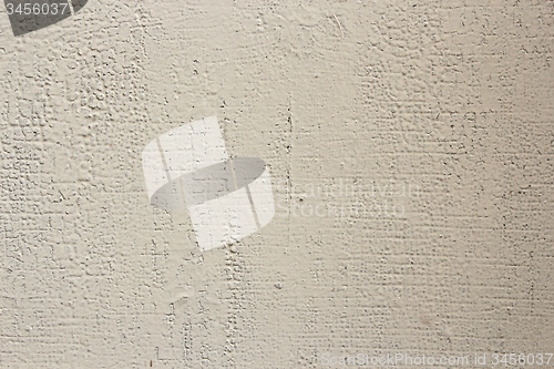 Image of plaster on cement wall