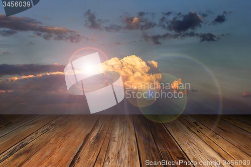 Image of wood terrace background over beautiful sky