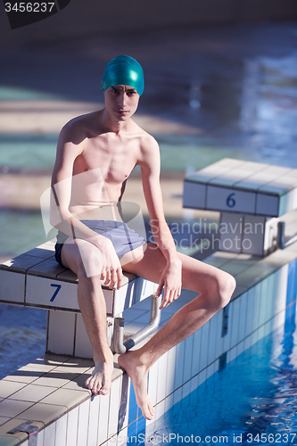 Image of swimmer excercise on indoor swimming poo