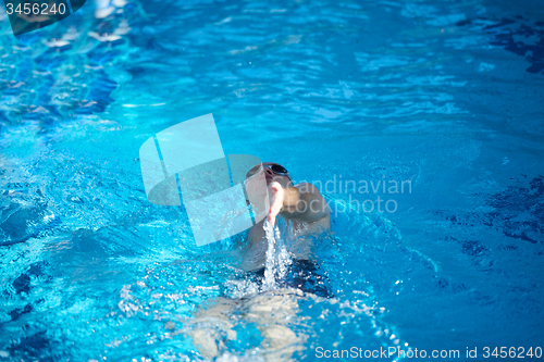 Image of swimmer excercise on indoor swimming poo