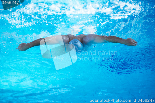 Image of swimmer excercise on indoor swimming poo