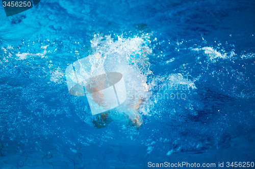 Image of swimmer excercise on indoor swimming poo