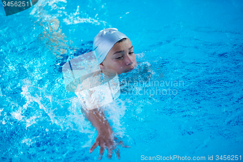 Image of child on swimming poo