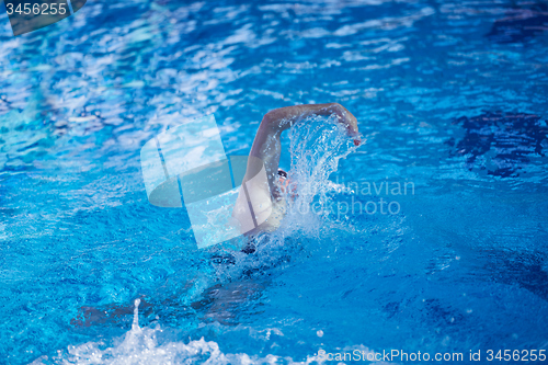 Image of swimmer excercise on indoor swimming poo