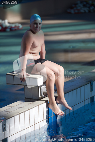 Image of child portrait on swimming pool