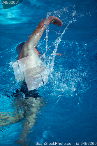 Image of swimmer excercise on indoor swimming poo