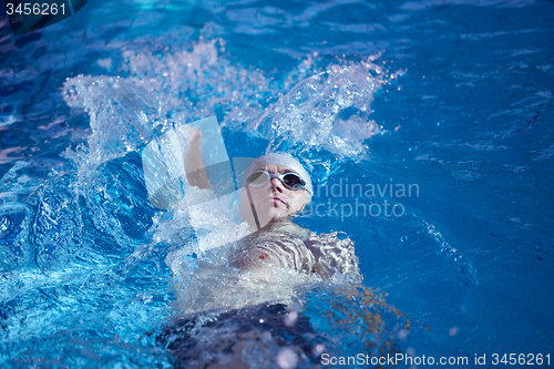 Image of swimmer excercise on indoor swimming poo