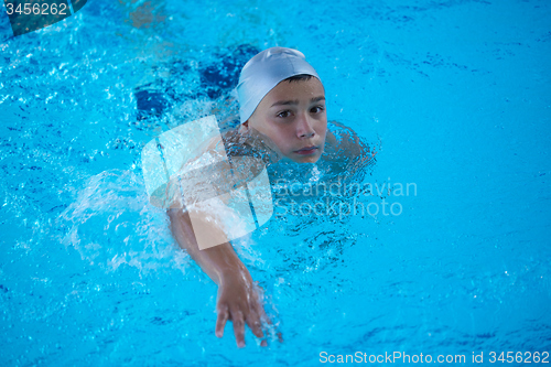 Image of child on swimming poo