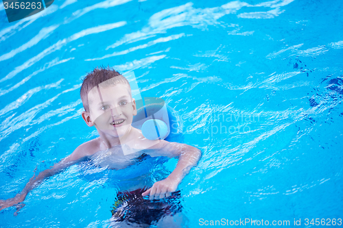 Image of child on swimming poo