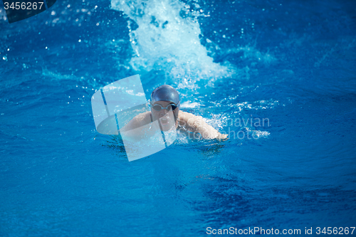 Image of swimmer excercise on indoor swimming poo