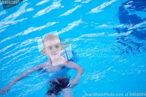 Image of child on swimming poo