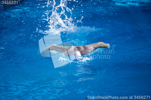 Image of swimmer excercise on indoor swimming poo