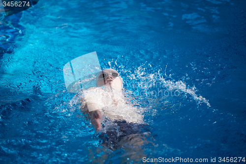 Image of swimmer excercise on indoor swimming poo