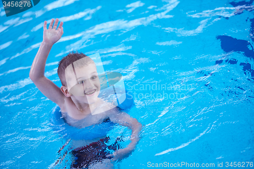 Image of child on swimming poo