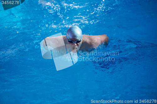 Image of swimmer excercise on indoor swimming poo