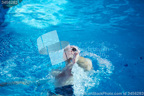 Image of swimmer excercise on indoor swimming poo