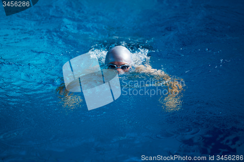 Image of swimmer excercise on indoor swimming poo