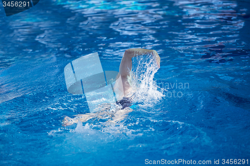 Image of swimmer excercise on indoor swimming poo