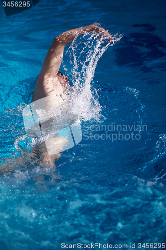 Image of swimmer excercise on indoor swimming poo