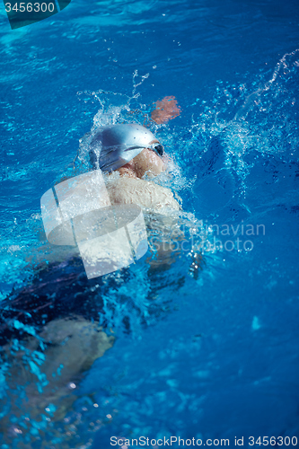 Image of swimmer excercise on indoor swimming poo