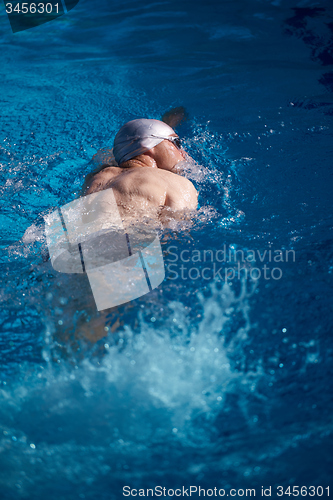 Image of swimmer excercise on indoor swimming poo