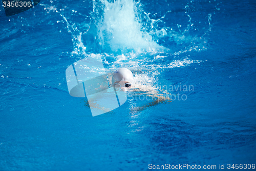 Image of swimmer excercise on indoor swimming poo