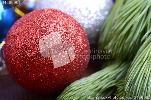 Image of Decorated christmas tree - holiday background, green tree eve branch close up with christmas balls 