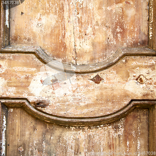Image of  traditional   door    in italy   ancian wood and traditional  t