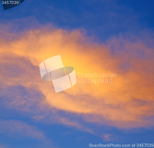 Image of the sunrise in  colored sky white soft clouds and abstract backg