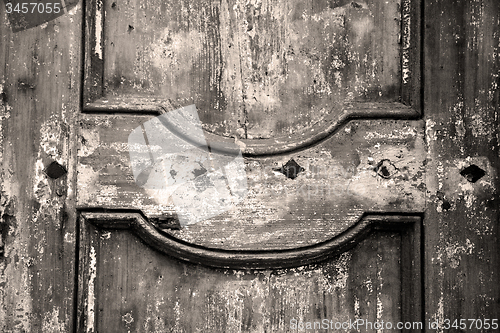 Image of  traditional   door    in italy   ancian wood and traditional  t