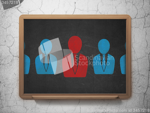 Image of Finance concept: business man icon on School Board background