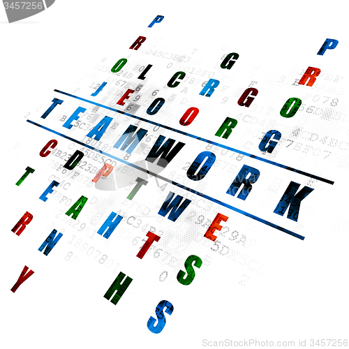 Image of Business concept: word Teamwork in solving Crossword Puzzle