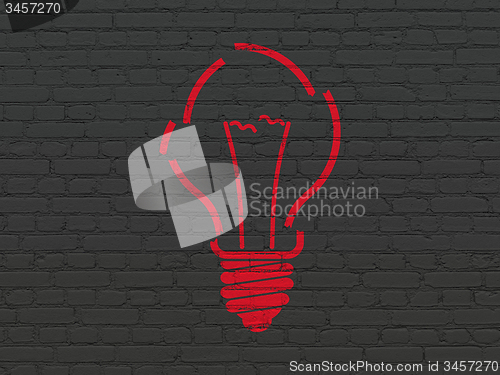 Image of Business concept: Light Bulb on wall background