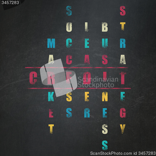 Image of Finance concept: word Credit in solving Crossword Puzzle